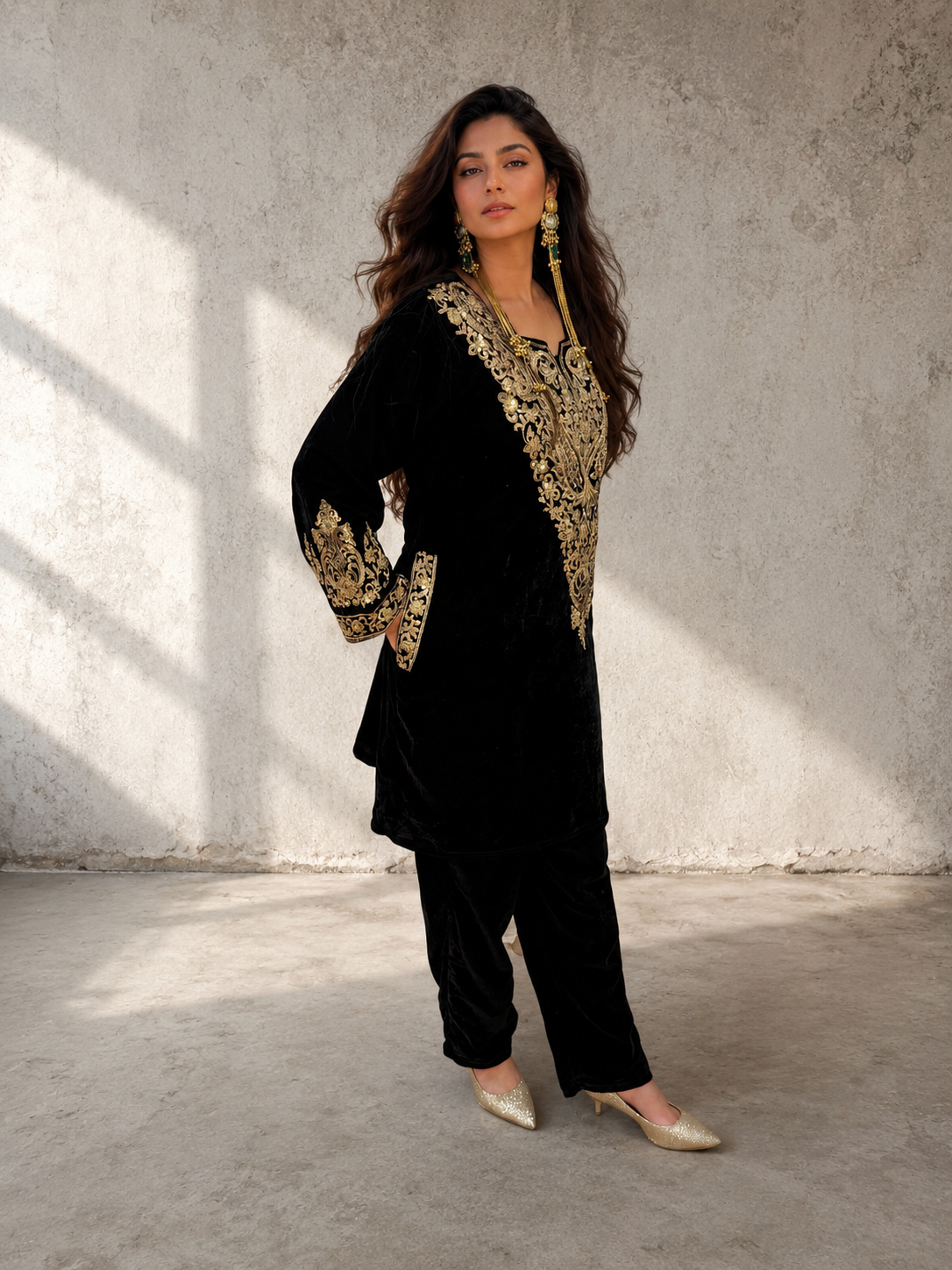 Black velvet Aari and hand embroidery kurta with matching black bottoms from Adishee