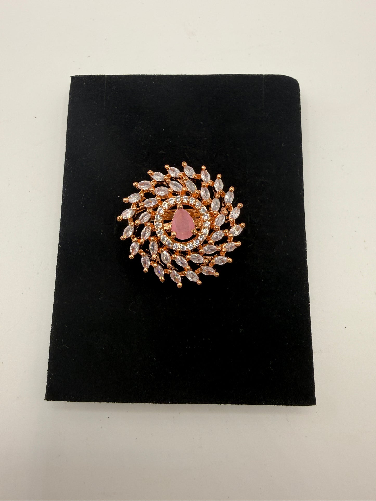 Rose Gold Crystal Swirl Statement Ring with Soft Pink Centre Stone