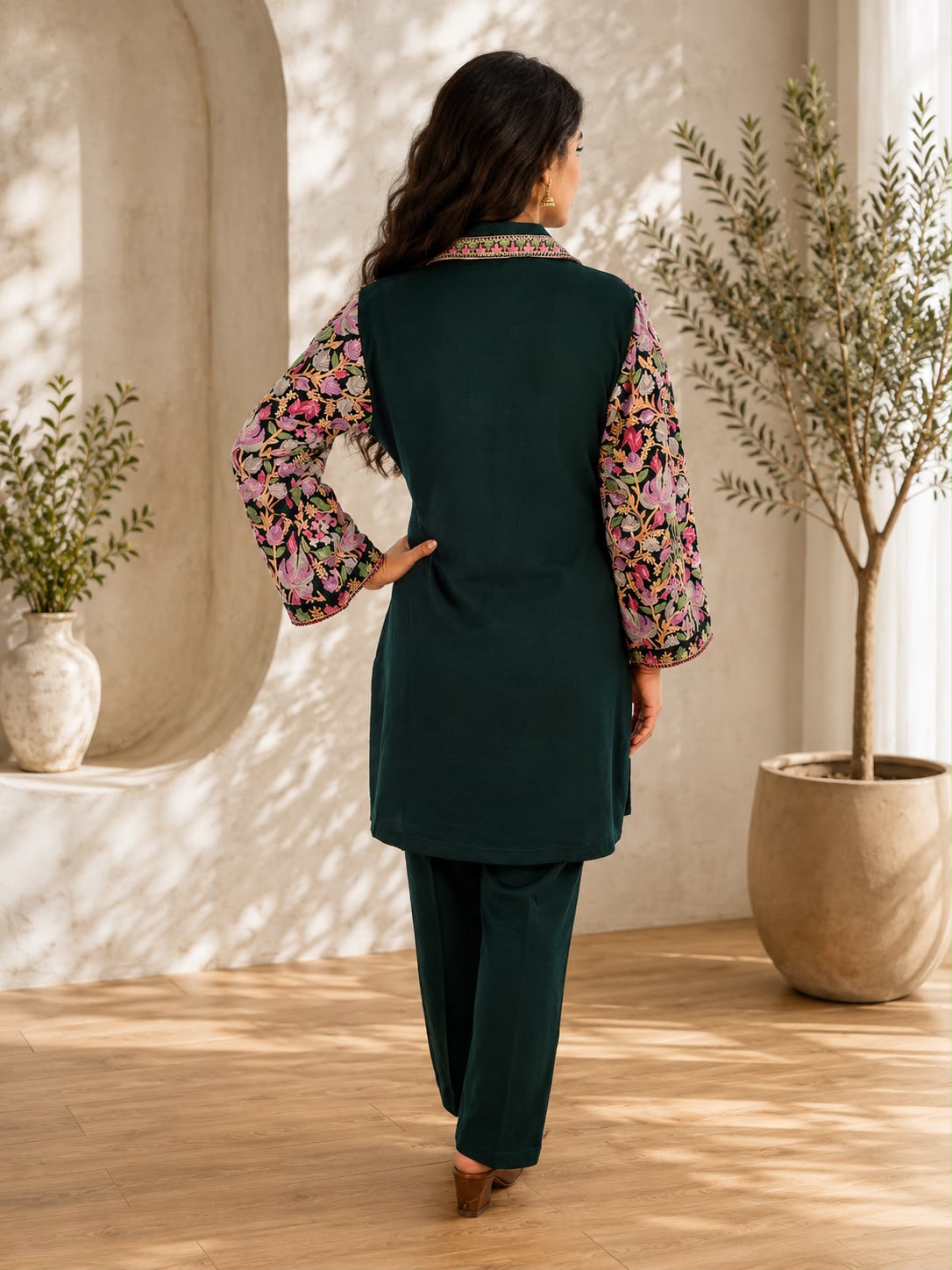 Back view of dark green floral Kashmiri kurta set with matching pants from Adishee