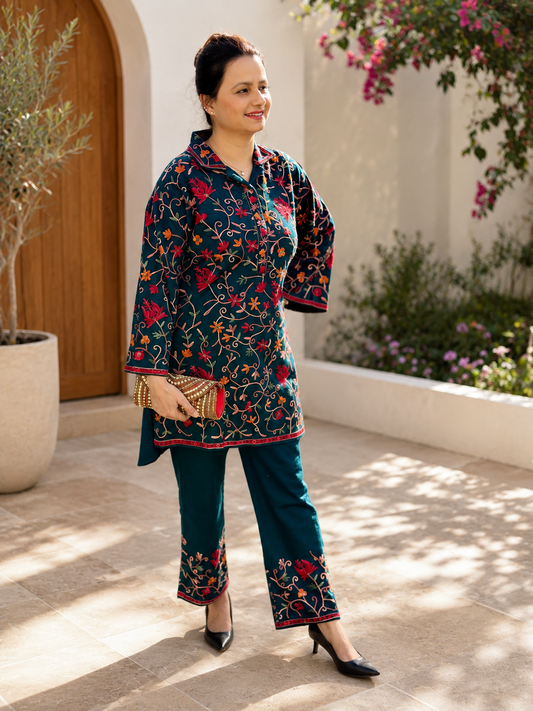 Teal floral co-ord kurta set with matching pants and colourful embroidered-style detailing for women by Adishee.