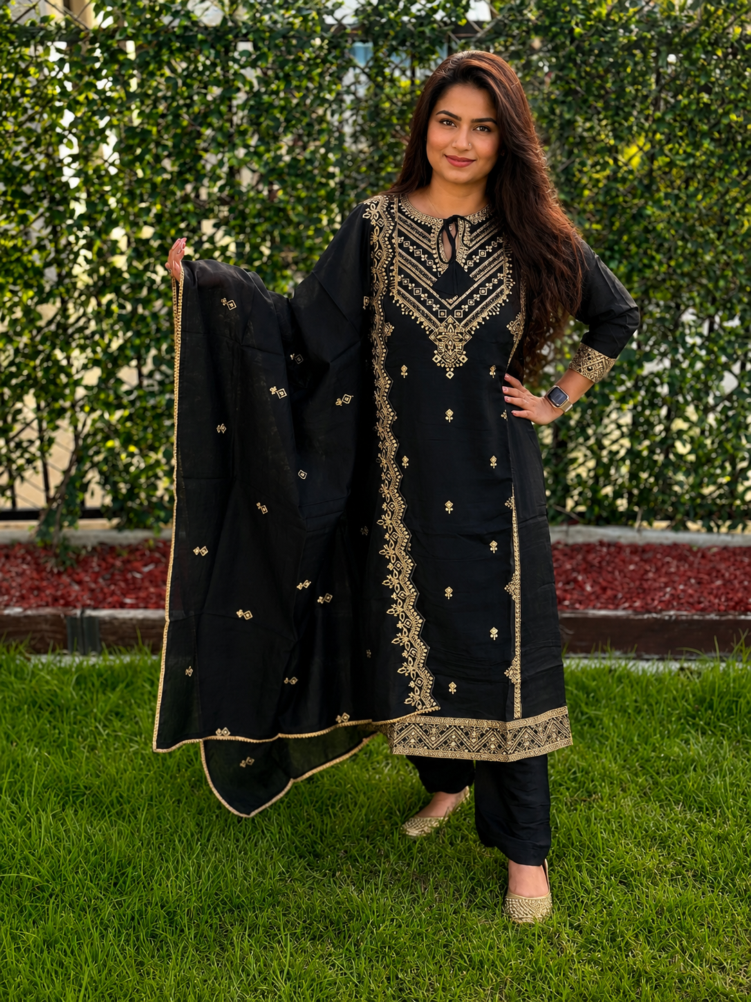 Black embroidered kurta set with matching pants, dupatta, and gold detailing for women by Adishee.
