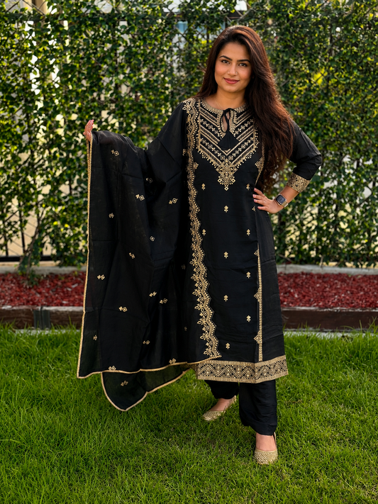Black embroidered kurta set with matching pants, dupatta, and gold detailing for women by Adishee.