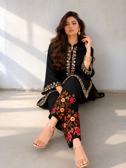 Black embroidered kurta set with floral pant detailing for Indian party and occasion wear