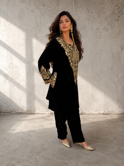 Black velvet Aari and hand embroidery kurta with matching black bottoms from Adishee