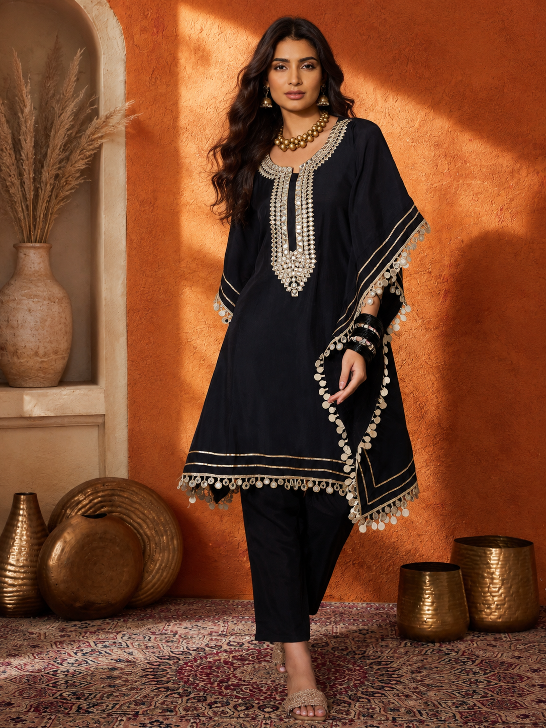Women's black embroidered kaftan co-ord set featuring intricate silver embroidery, flowing kaftan sleeves, and matching straight-fit pants, perfect for festive and party wear.
