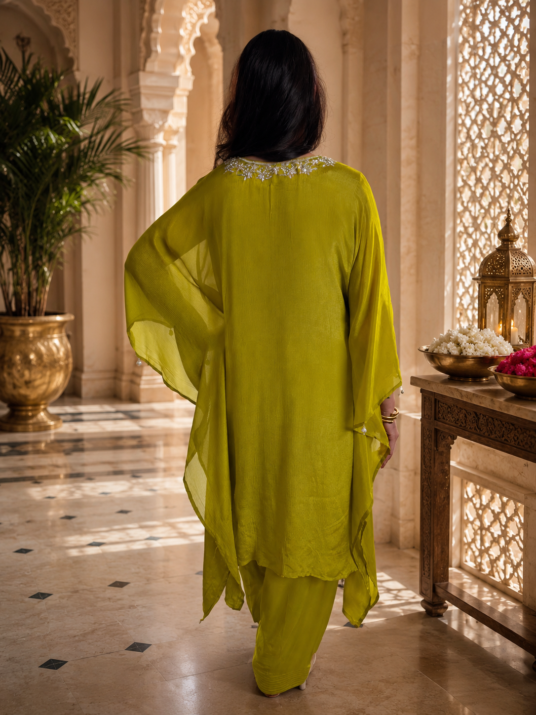 Back view of a women's olive green embroidered kaftan suit set showcasing the elegant flowing silhouette and matching pants by Adishee Australia.