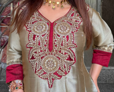 Gold Giraffe Tissue embroidered Anarkali 2-piece set with ruby detailing and matching sheer ruby dupatta.