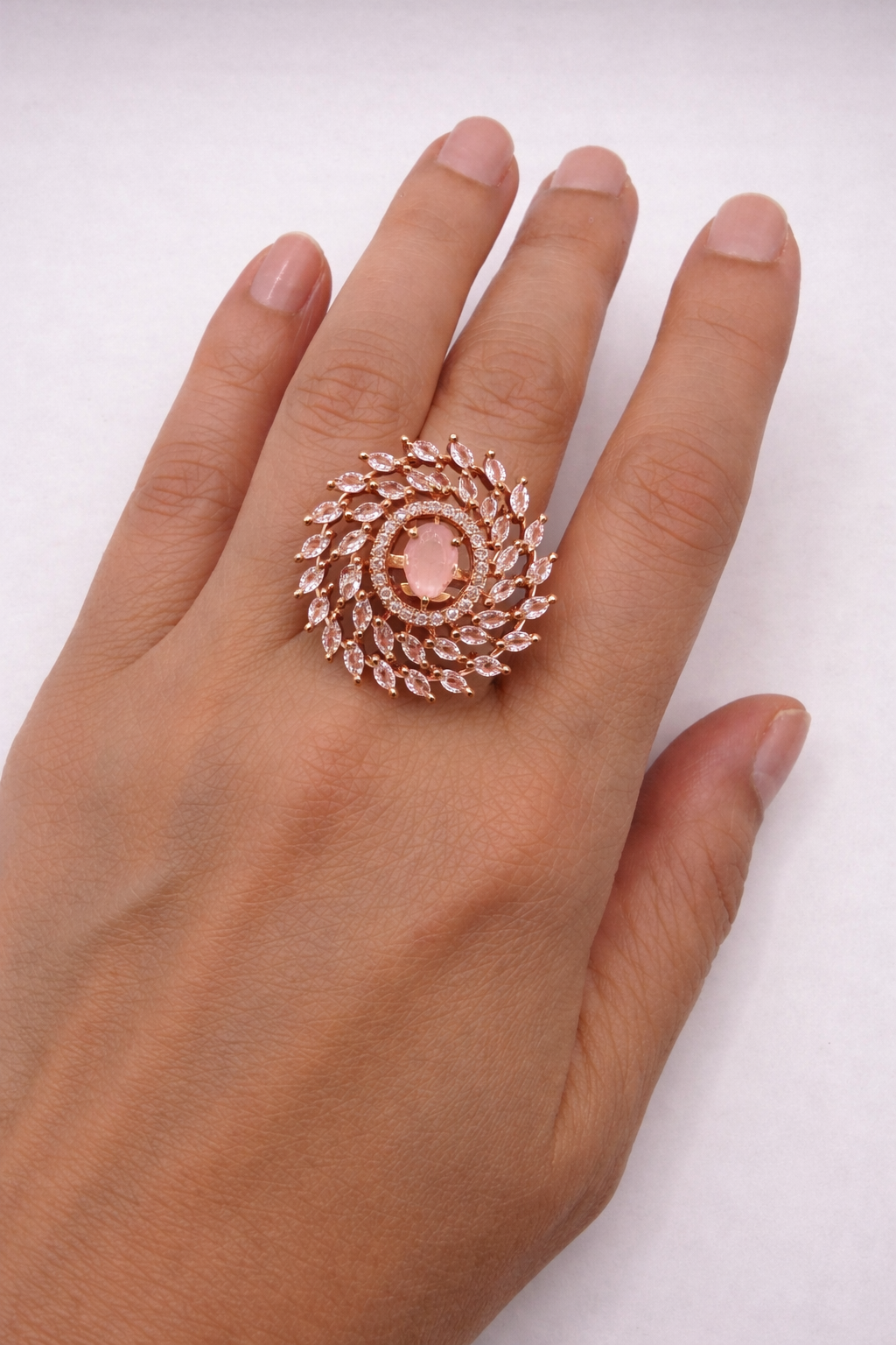Rose Gold Crystal Swirl Statement Ring with Soft Pink Centre Stone