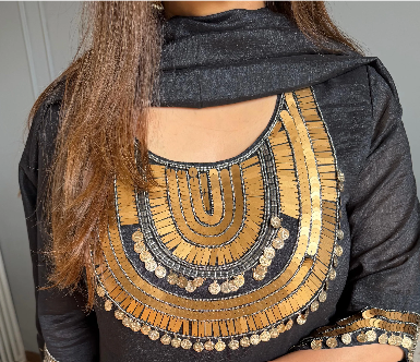 Black silk tissue embroidered pant set with gold detailing, wide-leg pants and matching dupatta.