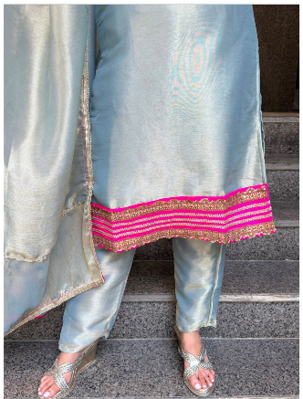 Ice blue Giraffe Tissue 3-piece set with hot pink and gold embroidery, matching pants and dupatta.